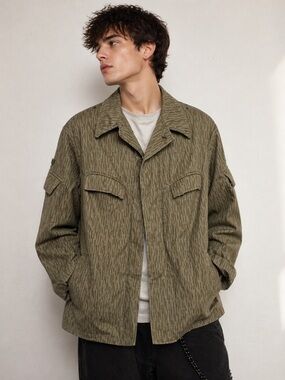 Vintage military-style field jacket in iconic German “rain camo” pattern 🌿